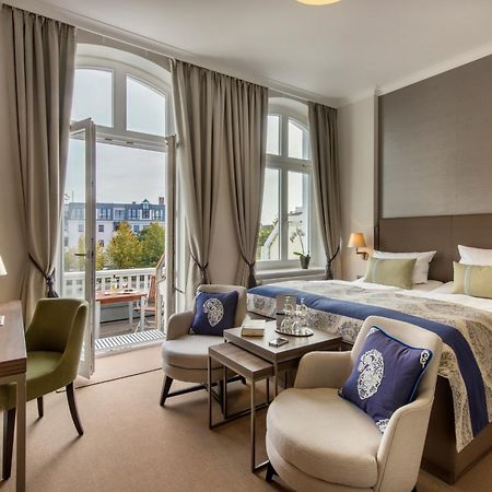 Hotel Am Leuchtturm Росток Экстерьер фото