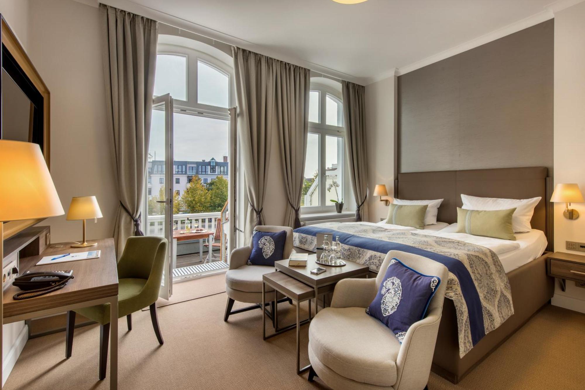 Hotel Am Leuchtturm Росток Экстерьер фото