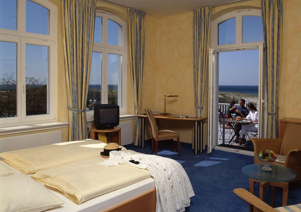Hotel Am Leuchtturm Росток Экстерьер фото