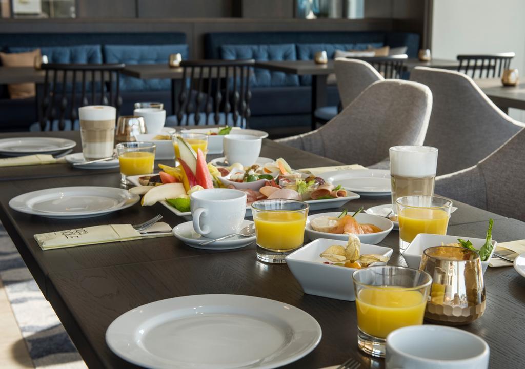 Hotel Am Leuchtturm Росток Экстерьер фото