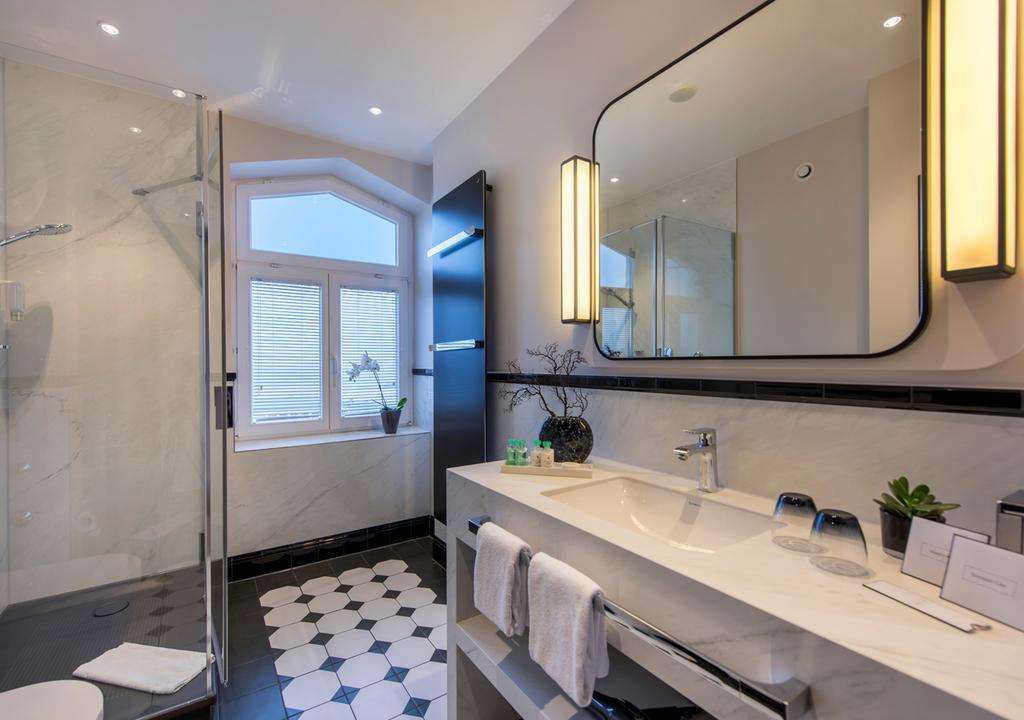 Hotel Am Leuchtturm Росток Экстерьер фото