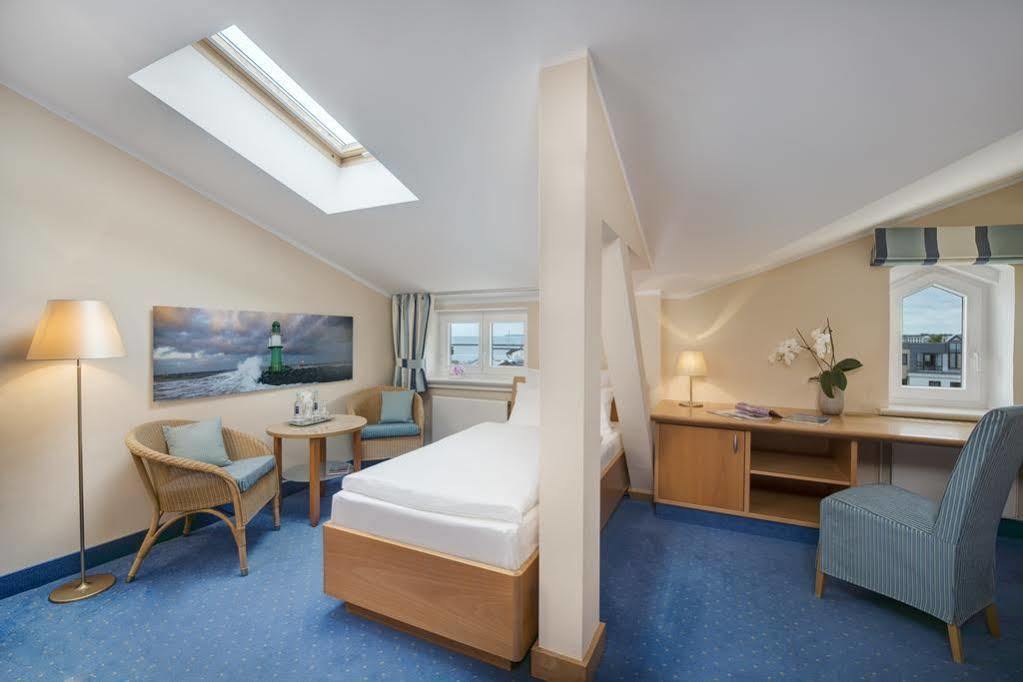 Hotel Am Leuchtturm Росток Экстерьер фото