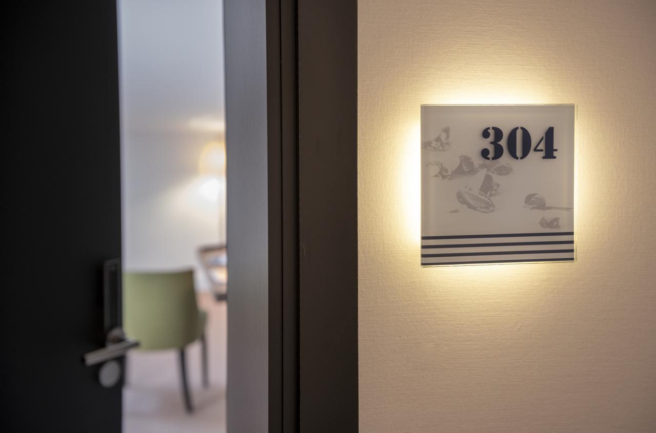 Hotel Am Leuchtturm Росток Экстерьер фото