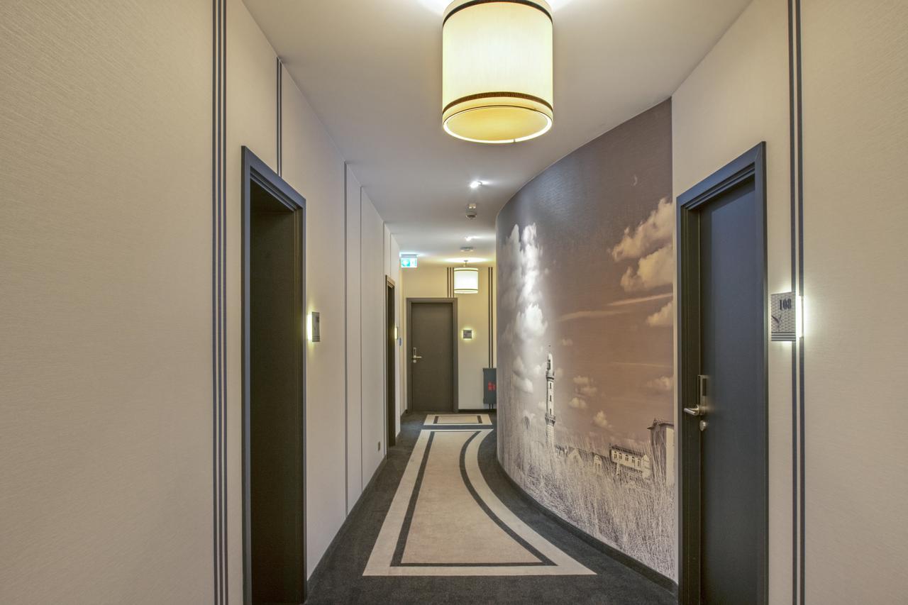 Hotel Am Leuchtturm Росток Экстерьер фото